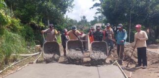 Babinsa Koramil 05/Serbelawan Pantau Pembangunan Rabat Beton di Nagori Kahean