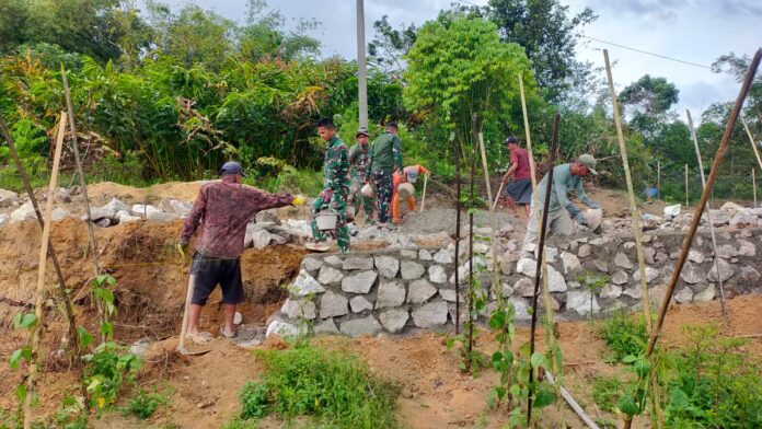 satgas tmmd tembok jalan